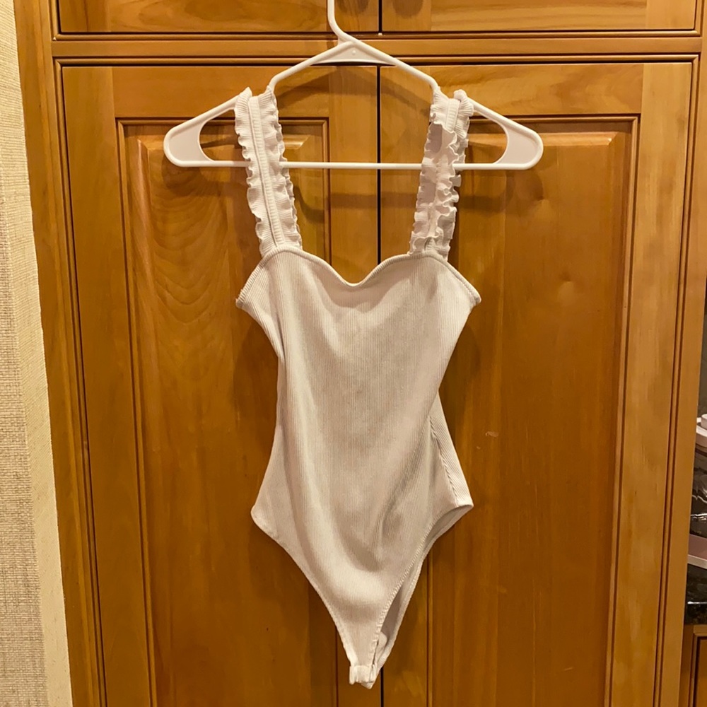 Ruffled body suit